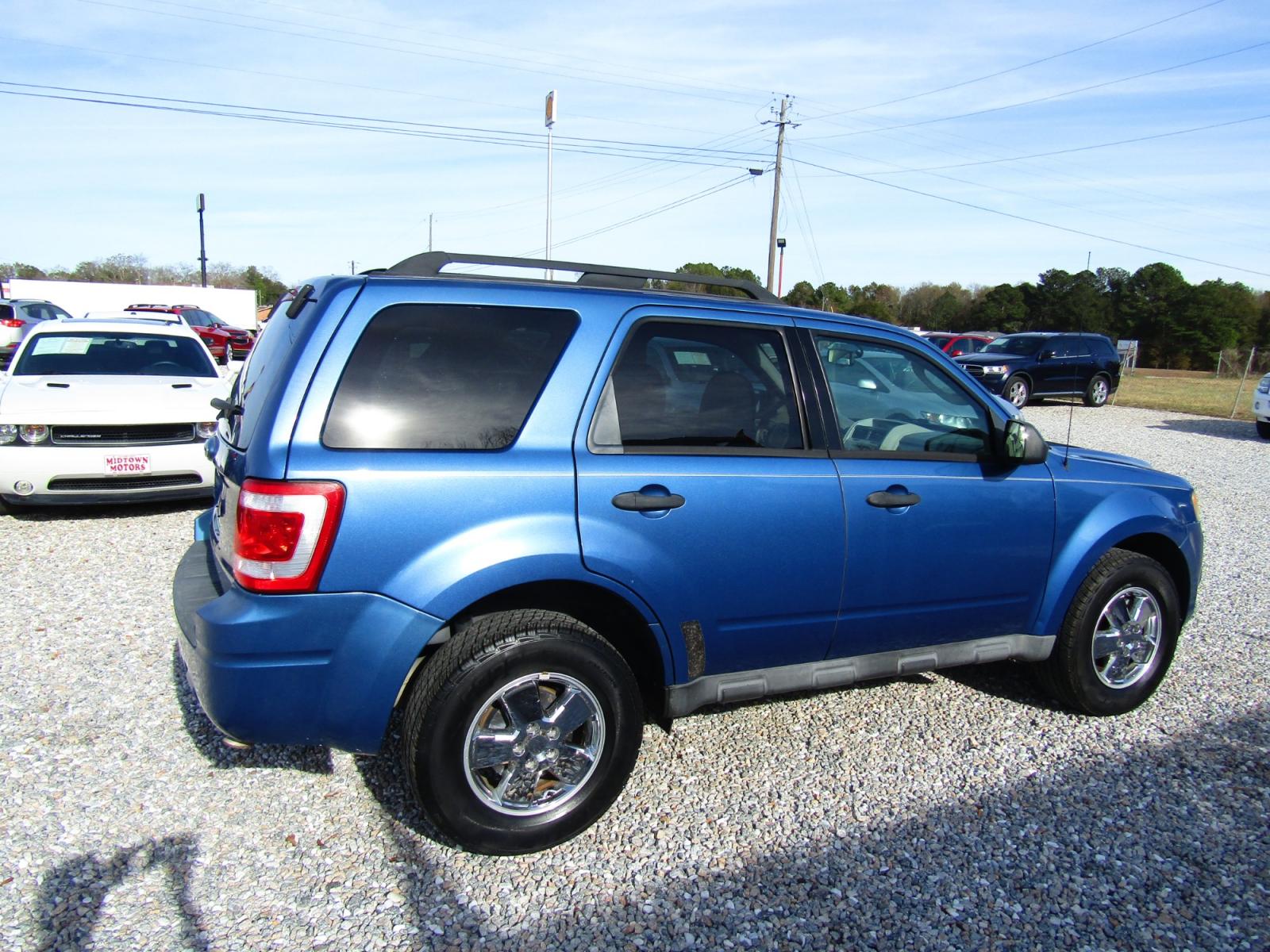 2010 Blue /Black Ford Escape XLT FWD (1FMCU0D72AK) with an 2.5L L4 DOHC 16V engine, Automatic transmission, located at 15016 S Hwy 231, Midland City, AL, 36350, (334) 983-3001, 31.306210, -85.495277 - Photo #7